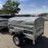 Прицеп Титан 1713-05 с высоким бортом и низким тентом
