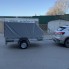 Прицеп Титан 2513-03 со средним скошенным тентом